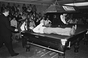 Snooker player Steve Davis doing an exhibition for fans on the road. 8rh June 1981