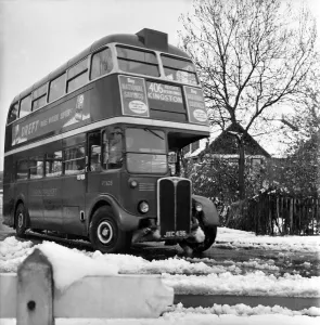 Double Decker Prints: Snow on the road in Tadworth, making journeys difficult for traffic