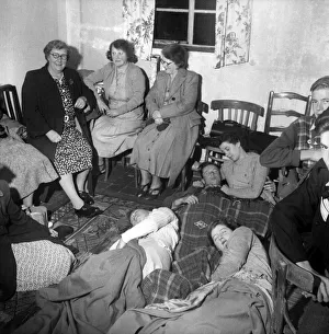 00010 Prints: Snowdon - Holidaymakers sleep on the floor of the Summit Hotel following the breakdown of