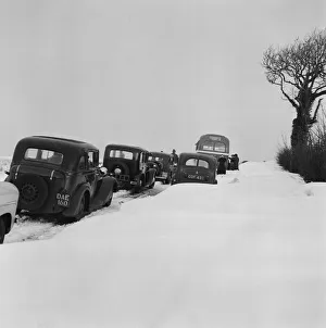 Snowed up roads in Bath - Stroud Road Traffic builds as cars are abandoned in