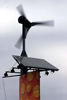 Air Pollution Prints: Solar panels topped by wind turbines September 1999 at the new Sainsburys Supermarket