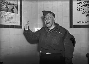 Thumbs Up Prints: A soldier giving the thumbs up'following his evacuation from Dunkirk June 2nd
