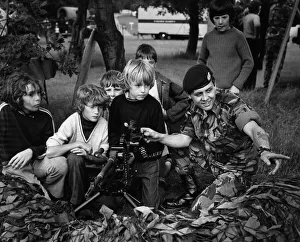 Show Prints: A soldier from the Green Jackets giving a demonstration to children at the St Helens show