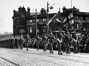 Flags Prints: Soldiers of the 1st Battalion Lancashire Fusiliers seen here marching through the centre