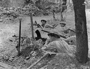 Italy Prints: Soldiers of the 24th Guards Brigade give covering fire to a fighting patrol advancing
