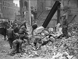 Tin Helmets Prints: Soldiers brought in to Coventry to help with the clear up following the heavy German air