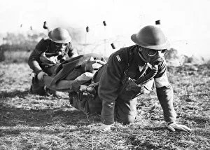 Casualties Prints: Soldiers carrying the wounded during WWII. 15th February 1941