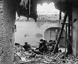 01452 Prints: Three soldiers of a Company of a British Army regiment watching for snipers in the German