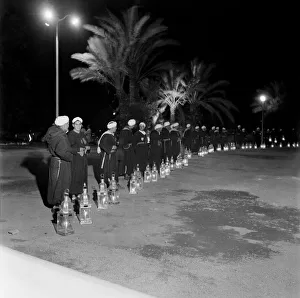 Arabic Prints: Soldiers on guard with their lamps in Marrakech, Morocco December 1952