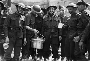 01435 Prints: Soldiers helping to clear up the wreckage after an air raid on the city of Hull