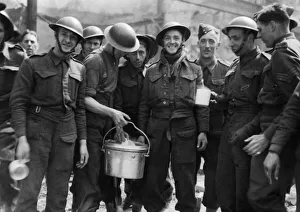 01433 Prints: Soldiers helping to clear up the wreckage after a raid on Humberside pose for a welcome