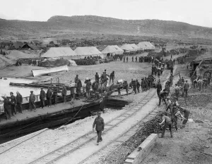 Tents Prints: Soldiers making up a fatigue party seen here landing stores from a lighter whilst