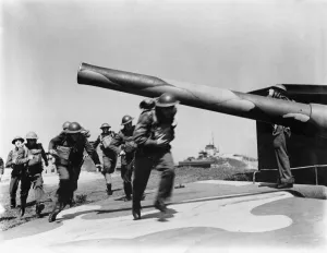 Soldiers manning one of the thousands of coastal defence guns against possible German