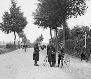 Soldiers seen here checking papers. No one is allowed to proceed in Belgium without a