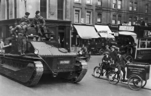 00278 Prints: Soldiers seen here patrolling the streets of London in their Vickers Medium tanks