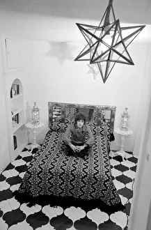 Songwriter Barry Ryan (dark shirt) in his flat in North Audley Street