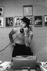 Songwriter and composer Lionel Bart in his flat in South Kensington
