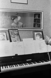 Songwriter and composer Lionel Bart in his flat in South Kensington