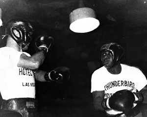 Gloves Prints: Sonny Liston displays his talents in a three-round work-out with sparring partner