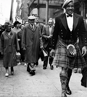 Kilt Prints: Sonny Liston World Boxing Champion walking in Glasgow, Scotland