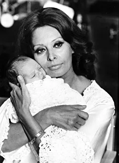 Sophia Loren actress holding baby to recreate the birth of her first child Carlo for a