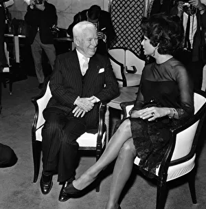 Sophia Loren and Charlie Chaplin at a press conference at the Savoy Hotel, London