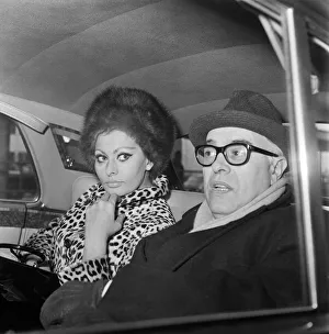 Sofia Prints: Sophia Loren and her husband Carlo Ponti arriving at London Airport. 15th January 1966