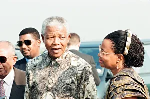 World Leader Prints: South African Preident Nelson Mandela seen here at Heathrow airport with Graca Machel