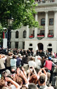 Photographers Prints: South African President Nelson Mandela addressing the crowds from the balcony of South