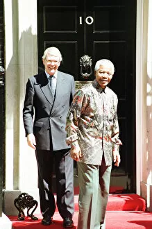 Images Dated 7th February 2011: South African President Nelson Mandela is welcomed by British Prime Minister John Major
