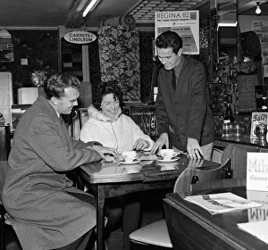 00808 Prints: Southampton and England footballer Terry Paine at work as a furniture salesman
