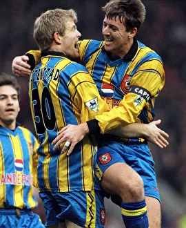 Southampton footballer Egil Ostenstad celebrates with team mate Matthew Le Tissier after