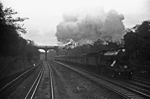 Tracks Prints: A Southern Railways Drummond T14 locomotive in full steam on the Waterloo mainline