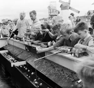 Sunshine Prints: Southport, children fishing for lucky fish at the childrens fairground, Merseyside