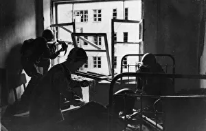 Casualties Prints: Soviet nurses on the front line tend to wounded soldiers of the Red Army in a shattered
