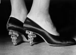 High Heels Prints: Sparkling chandelier drops from the heel of the evening shoes-displayed at a fashion show