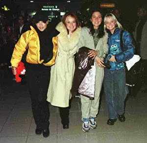 The Spice Girls at Heathrow Airport January 1998 Victoria Adams Geri Halliwell Mel