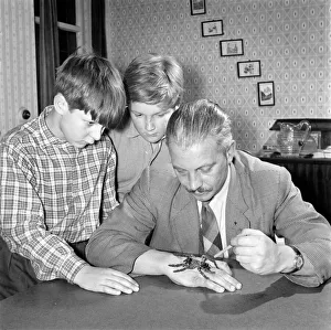 Insects Prints: Spider collector Mr. S. Ormorod seen here showing the children two of his collection