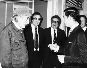 Spike Milligan with fellow Goon members minus Michael Bentine meet Prince Charles at a