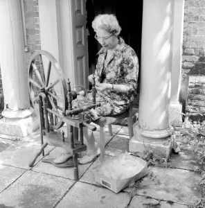 Textile Prints: The SpinnersI guild of Kent. Women using hand operated loom