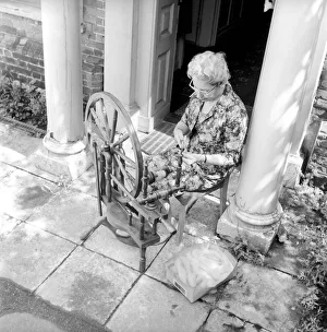The SpinnersI guild of Kent. Women using hand operated loom