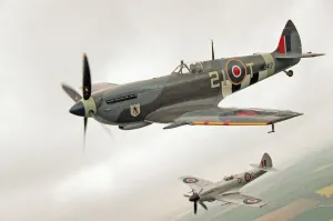 01155 Prints: A Spitfire Mk IXe (ML417) flying in formation with a Mk XIV Spitfire of the Fighter
