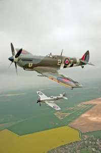 01155 Prints: A Spitfire Mk IXe (ML417) flying in formation with a Mk XIV Spitfire of the Fighter