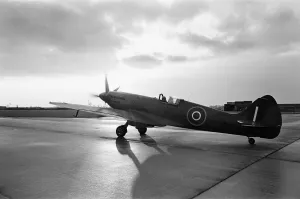 Clouds Prints: Spitfire PM631 a mk PRXIX aircraft seen here taxi-ing along the perimeter track at RAF