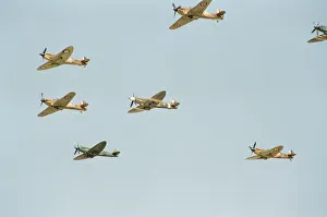 Formation Prints: Spitfires and Hurricanes seen here during the flypast to commemorate the 50th Anniversary