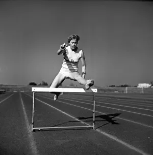 Hurdle Prints: Sport: Athletic s. British runner Mary Rand pictured during training session