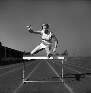 Hurdle Prints: Sport: Athletic s. British runner Mary Rand pictured during training session