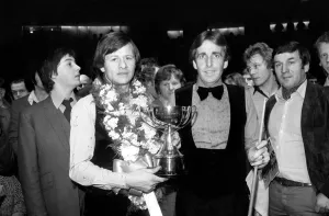 Sport: Benson & Hedges Masters Snooker Championship. Alex Higgins who defeated Terry