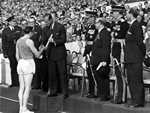 Sport - Empire and Commonwealth Games - 1958 - The Duke of Edinburgh receives the baton