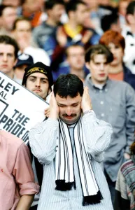 00607 Prints: Sport - Football - Swansea City - A Swans fan shows is despair after his team lost in